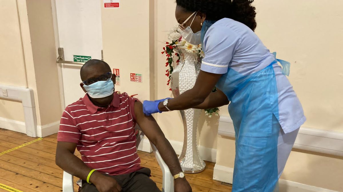 Pastor Vincent Ibikunle receives his Covid-19 vaccination